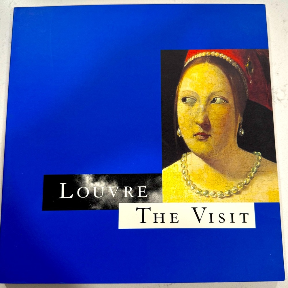 Beautiful Louvre coffee table book.